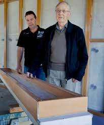 Brendan and Reginald Richards. JOHN KIRK-ANDERSON/Fairfax NZ. FAMILY PROJECT: Brendan, left, and Reginald Richards with their iPanel building system. - 7644410