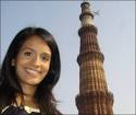 Sonali in front of the Qutub Minar - the tallest free-standing brick tower ... - _49436956_sat_delhi_qutubminar_sonali