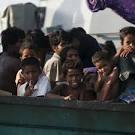 Myanmar says finds more than 200 Bangladeshis in boat offshore.