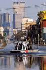 U.S. Coast Guard air boat navigates the flooded streets of New Orleans