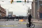 Baltimore Rocked by Violence, Looting, Fires; At Least 15 Police.