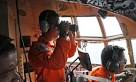 Missing AirAsia flight: search area set to expand as families.