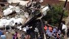 BBC News - Taiwan plane crash: Toll hits 48 as families visit scene