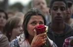 Elizabeth Amundsen,16, cries as hundreds of thousands of people gather at a ... - bp2