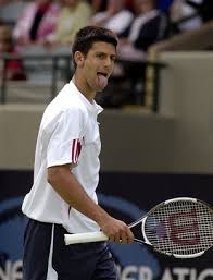 Novak Djokovic sticks out his