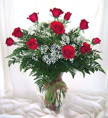 http://t3.gstatic.com/images?q=tbn:KGunl0-75aYk4M:http://christophersflowers.com/Doz%20roses.JPG