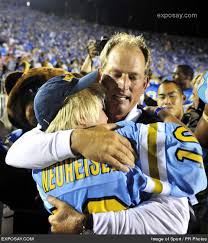 Rick Neuheisel and son Joe