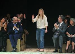 Sarah Burton takes a bow after