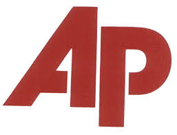 Associated Press posts losses