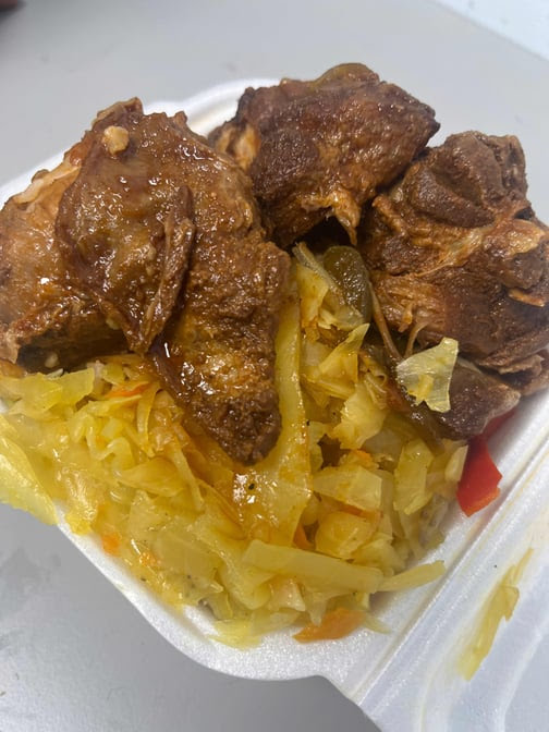 Quality Taste Jamaican Restaurant & Jerk Hut by null