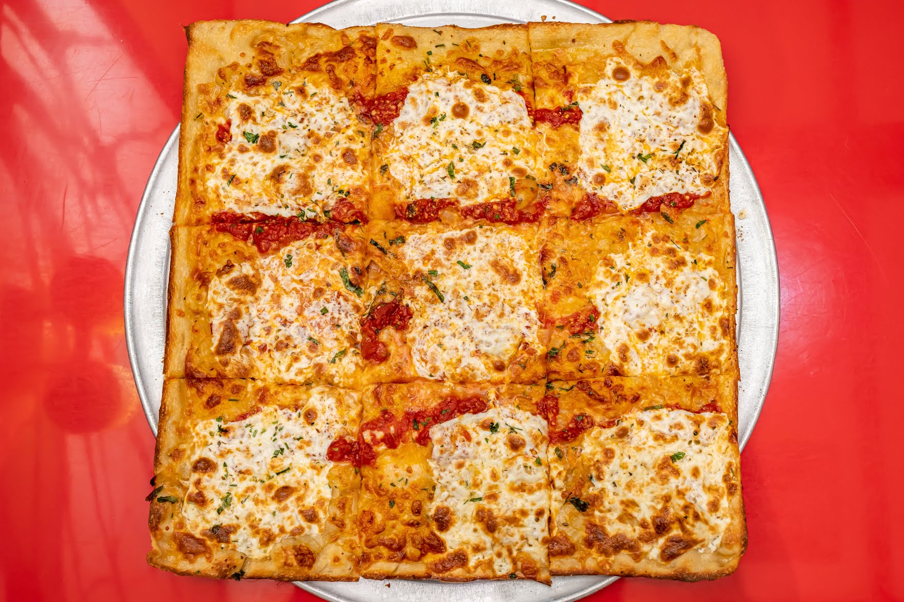 Gino’s Pizzeria by null