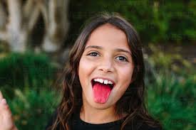 tongue girl|Young Chinese-American girl being silly sticking tongue out Stock Photo -  Alamy