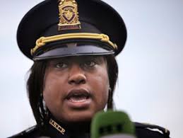 Police station years old police officer handcuffs woman and men jpg x Police officer