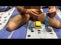 Inexperienced guy fucks a homemade sex toy and cums inside jpg x Homemade male sex toys