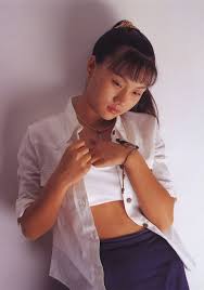 rika nishimura|A close up of a young girl wearing a white shirt - SeaArt AI