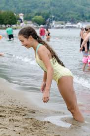 Little girls bent over|Adorable Little Girl In Swimsuit Leaning At Free Stock Photo and Image  168711946