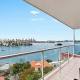 Waterfront apartment in Sydney sells for $1 million over reserve price 