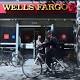 Banking Regulator Imposes New Restrictions on Wells Fargo 