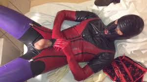 Naughty milf dee delmar jerks mysterious man latex uniform jpg x Latex man
