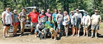 Riding on dog the pines|Today is a very special day because our favorite camp dog turns TWO!🥳  Happy birthday to our golf cart-riding, pond-jumping, bur-finding,  camp-loving gal, Luna Schuna!🎉