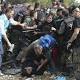 Macedonian Police Clash With Migrants on Border With Greece 