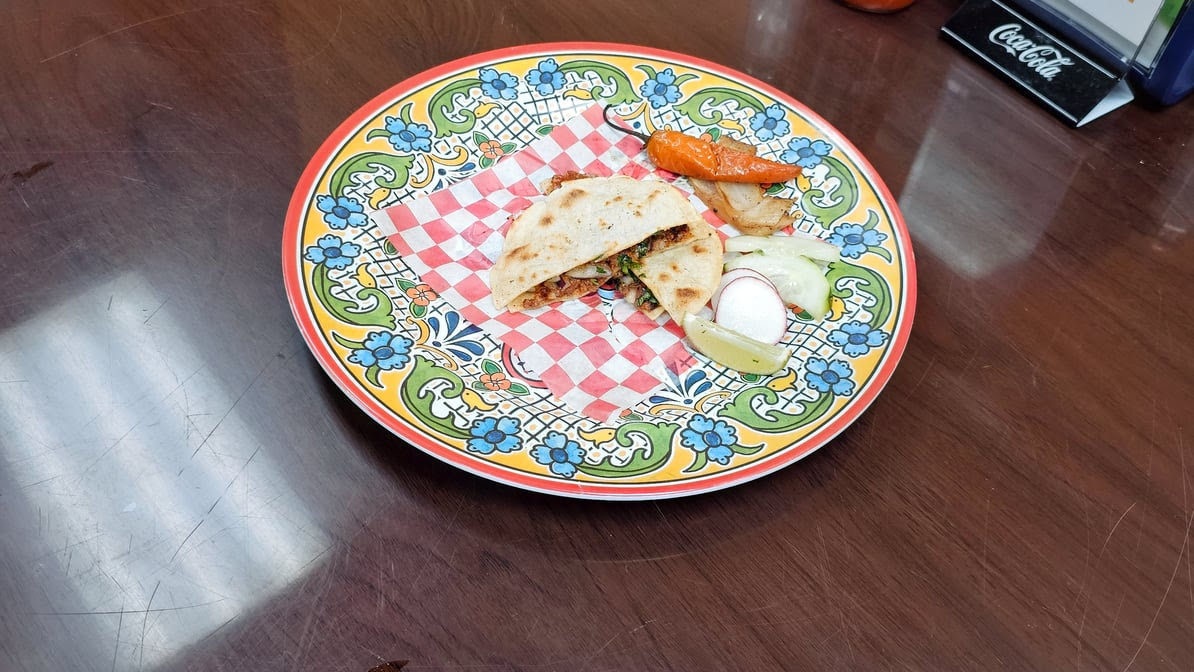 Tacos y Mariscos Los Carnales inc. by null