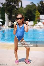  little girl toddler|Cute Child having fun outdoors, little girl cowboy playing in wheat field  at sunset. Happy baby girl with toy gun and cowboy hat enjoying nature.  American Cowgirl. lovely smiling toddler portrait. の