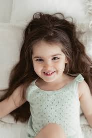 kids girl models|Little girl model wearing stylish clothes in marine style outdoors.  Charming child sits on pier bridge, resting summer, day. 6-7 years old  models. Fashion kid concept. の Stock フォト | Adobe Stock