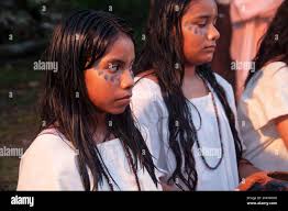 Mexican village girl|young girl walks sidewalk of Mexican Village Stock Photo - Alamy
