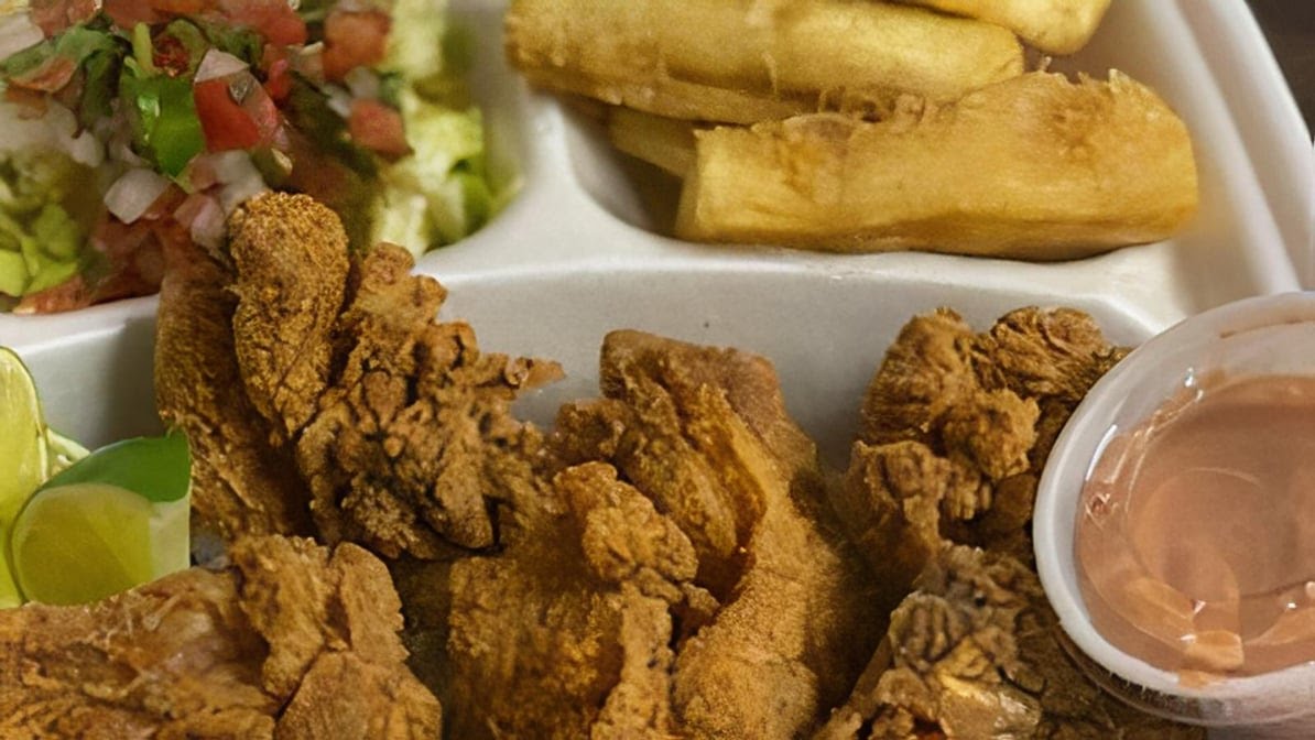 Pura Vida Jamaican and Costa Rican Cuisine by null