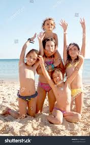 Little topless girl on beach|Little Girl On The Beach - Stock Photos | Motion Array