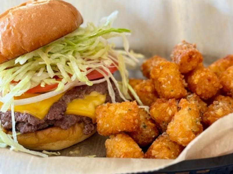 Metropolitan NY Pizza+Burgers+Cocktails by null