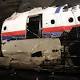 The MH17 plane partially reconstructed as crash report blames a Russian Buk missile strike. Picture: Ella Pellegrini 