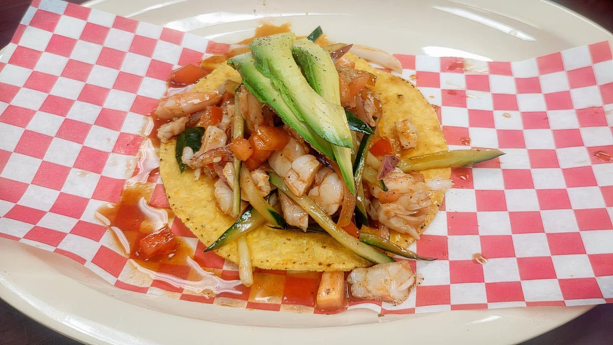 Tacos y Mariscos Los Carnales inc. by null