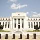 Fed signals caution on rate hikes, worried by global growth: minutes 
