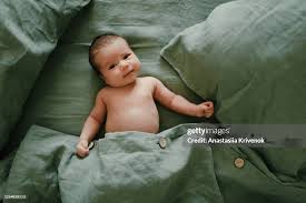 child naked girls|Top View And Closeup Portrait Of Cute Adorable Naked Baby Girl In Bedroom  Newborn Child Relaxing And Smiling In The Green Linen Parents Bed Family  Morning At Home High-Res Stock Photo -