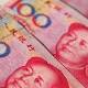 China's yuan slips after PBOC dashes appreciation hopes