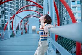 Free photo of woman relaxing on modern pedestrian bridge jpg x Xxx free young