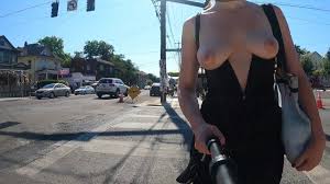 Beautiful chocolate porn star pulling out her tits in public jpg x Tits out in public