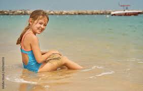 imgrcu ru topless  beach  little girl|Beautiful little girl on beach | Colourbox