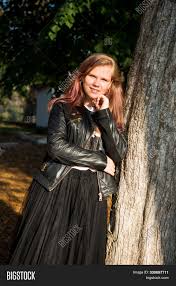 Leather outfit young girls|attractive asian young girl in black leather outfit with heavy makeup  standing sideways Stock Photo - Alamy