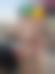 only one nude| video - naked girl walks among fully  clothed crowds