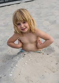 beach little garl|Little girl sits on beach stock image. Image of leisure - 10699159