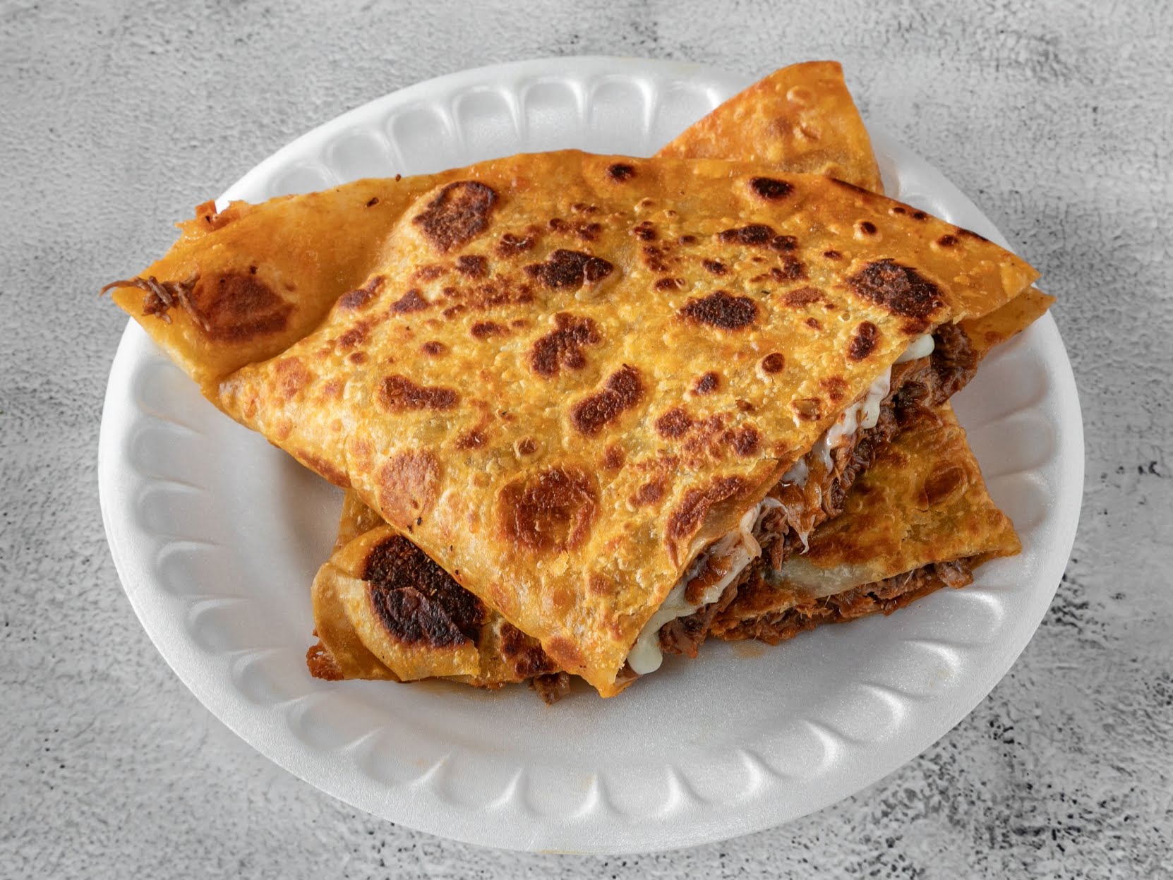 UNOS TACOS Y BIRRIA by null