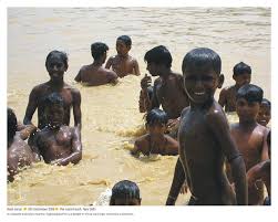 nudist  boy |boy sitting on beach beyond sea and sculpting figures of sand by hands  Hobby, leisure on summer vacation concept. の Stock フォト | Adobe Stock