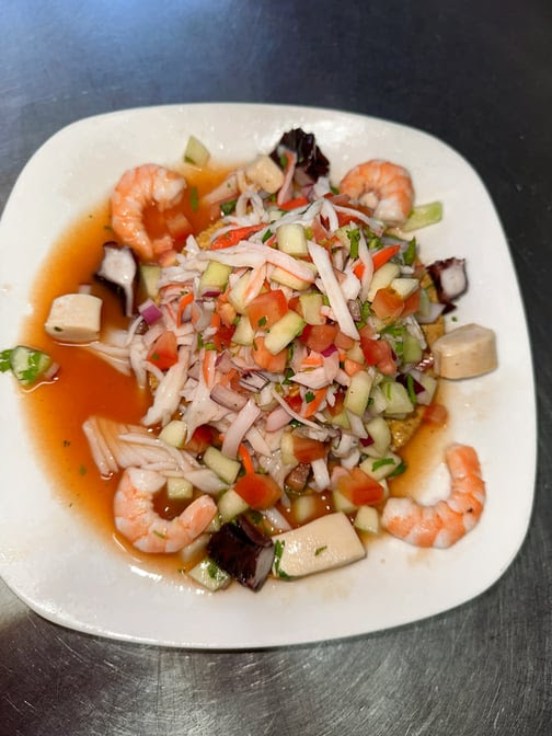 Mariscos y Sushi Los Tomateros by null