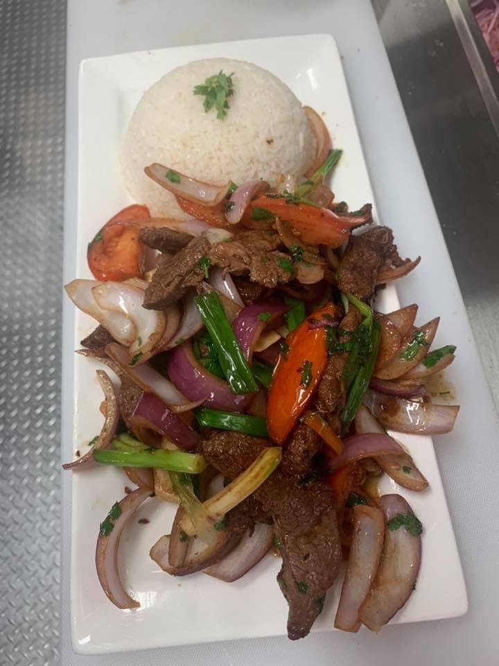 Salt & pepper Peruvian food cart 82 Ave by null