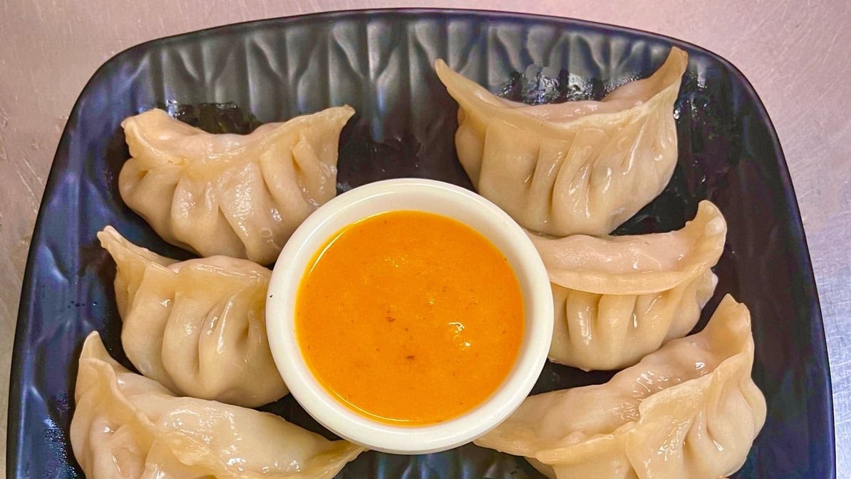 Cumin Indian Nepalese Restaurant by null