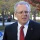 Australia plans major spending plus surplus in 3 years 