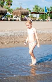 imgrcu ru topless  beach  little girl|Beautiful little girl on beach | Colourbox